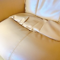 リクライニング　2人掛けソファー　オレンジ・ベージュ色の画像