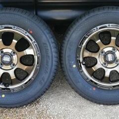 値下げしました。未使用　14インチアルミホイール、オールシーズンタイヤセット4本の画像
