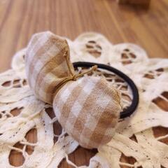 茶色のチェックのちょうちょゴム②ハンドメイドの画像