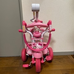 キティちゃん　三輪車　舵取り棒付きの画像