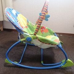 ベビーバウンサーと赤ちゃん用おもちゃの画像