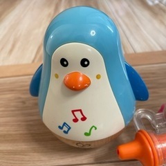 振り子のペンギンと笛の画像