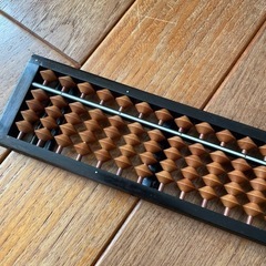 そろばんと墨汁の画像