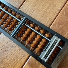 そろばんと墨汁の画像