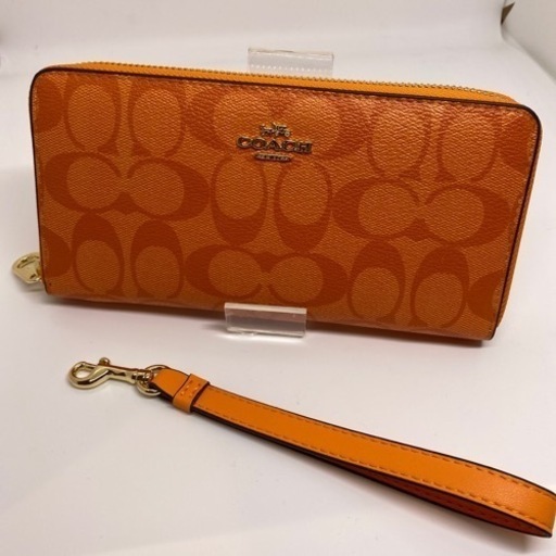 ［未使用品］coach シグネチャー ラウンド 長財布　オレンジ系