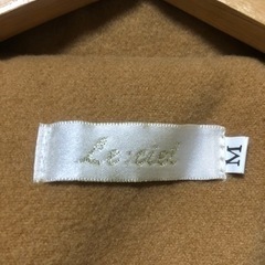 ベージュ　コート　の画像