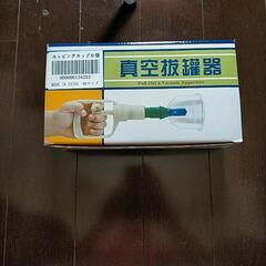 市販のマッサージ機、手動カップリングとマッサージ枕の画像