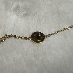 ニコちゃんマークのブレスの画像