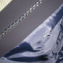 ミセスの　オーソドックスなスーツ　紺色　前ボタンなしの画像