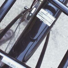 ノーパンクタイヤ自転車 27インチ 6段変速 リアキャリア クラス18