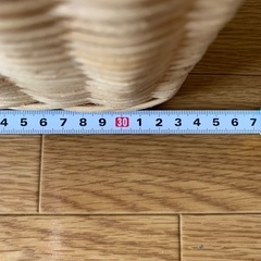 藤蔓製のカゴ　ホワイト系の画像