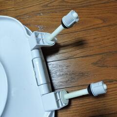 新品トイレ便座と便座カバーのセットの画像