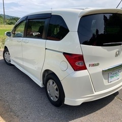 フリード 車検7年8月 12万㌔ ナビ Bカメラ 地デジ 左側電動 ETC の画像