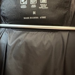 ユニクロ　シームレスダウン　メンズブラックMサイズの画像