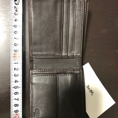 COACH二つ折り財布の画像