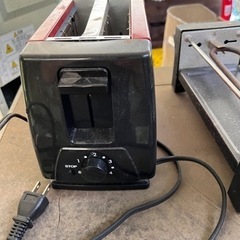 トースターと1人用焼肉機の画像