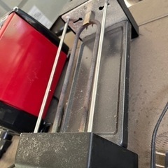 トースターと1人用焼肉機の画像