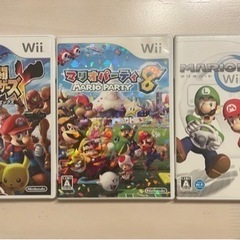 Wii本体/リモコン×7/ソフト×3の画像