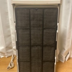 【引取人確定】空気清浄機　動作確認済  101076J  リモコン付(未使用)  シミあり　引き取り限定の画像