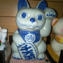 お帰りの手招き