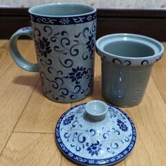 新品未使用 、蓋、茶こし付き 陶器コップの画像