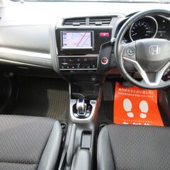 ホンダ　フィットハイブリッド　Ｌパッケージ 【自社ローン対応可】★1年保証★ロードサービス付　ワンオーナー　社外ＳＤナビ　地デジ　バックカメラ　ＥＴＣ　ハーフレザーシート　スマートキー　クルコン　オートエアコン　オートライト　ＬＥＤヘッドライトの画像