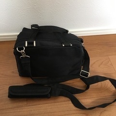一眼レフカメラ用バッグ、カメラお手入れセットの画像