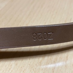 ノンブランド 茶 ベルト (約)長さ86cm✖️幅1.5cm 小さい傷ありの画像