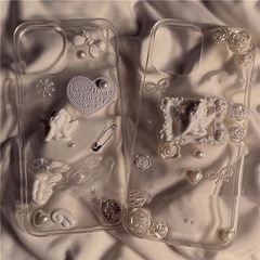 新品未使用　marcydorn エンジェル彫刻モチーフ クリアラメ iPhoneケースの画像