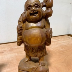 布袋様の木彫りの画像