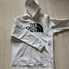 the north face パーカーの画像