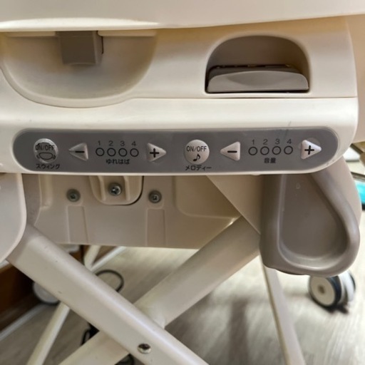 combi 電動ハイローチェア　オートスウィングラック