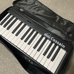 BX-11 電子ピアノ 61鍵盤 折り畳み式 スピーカー 外付け ワイヤレスmidi対応 折りたたみ 持ち運び可能 (黒い)の画像