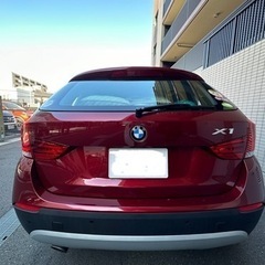 BMW X1  sDrive18i ⭐︎珍しい色バーミリオン・レッド⭐︎サンルーフ& シートヒーター付きの画像
