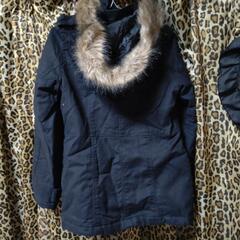 黒コートの画像