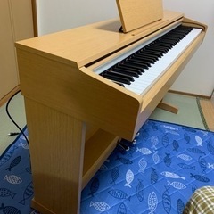 電子ピアノ（YDP-140C）の画像