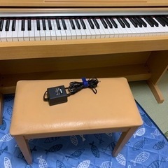 電子ピアノ（YDP-140C）の画像