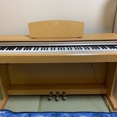 電子ピアノ（YDP-140C）の画像