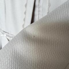 ベージュのレディースジャケットの画像