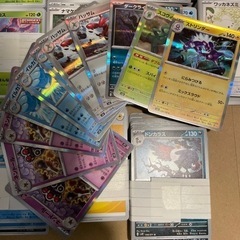 ポケモンノーマルカードと黒煙キラカードの画像