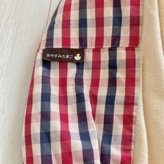 ベビークッション(おやすみたまご)とオムツセットの画像