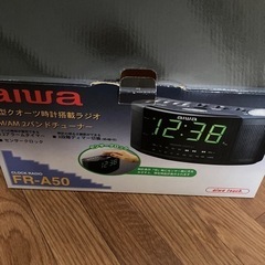aiwa 時計搭載ラジオ　新品　300円の画像