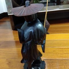 釣り人　民芸品の画像