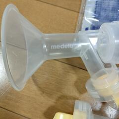 medela搾乳器とピジョンフリーザーパックの画像
