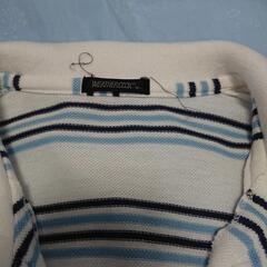 黒と水色のラインのポロシャツ  サイズMの画像