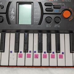 おもちゃの電子ピアノの画像