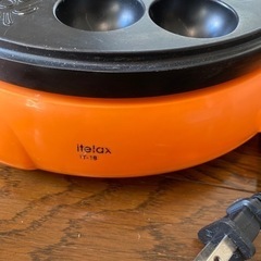 たこ焼き器とニトリ　ドライヤーホルダーの画像