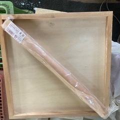 丸棒と木の皿値下げの画像