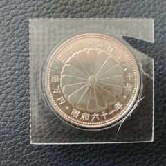 天皇陛下御在位60年記念1万円銀貨