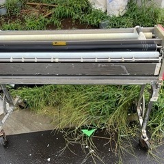 クロス糊付け機